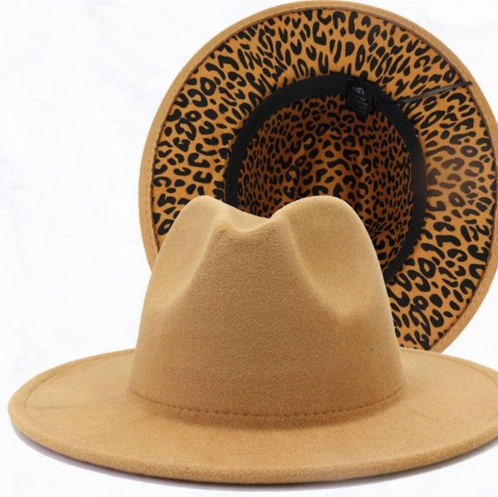 Brand new never worn. Camel Fedora with leopard bottom